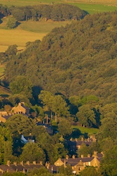 View across Hayfield village towards Elle Bank woods